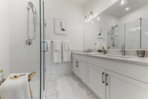 Ensuite in Cedarbrook Townhome with duel vanity and large glass shower